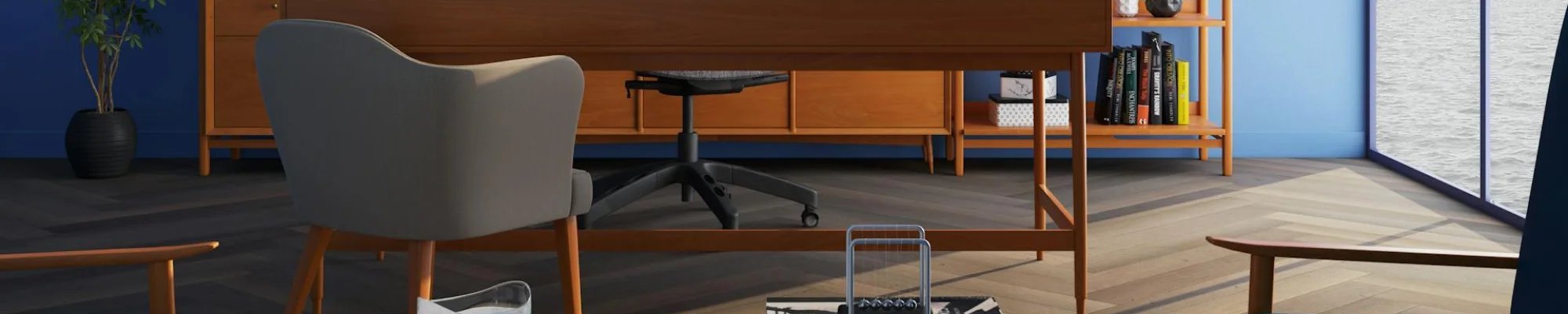 office with herringbone patterned hardwood floors and teak furniture