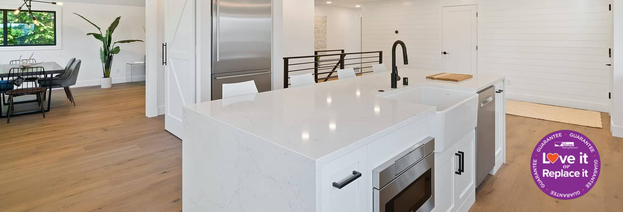 moisture resistant laminate flooring installed in modern kitchen